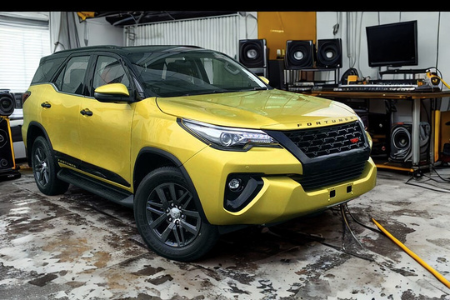 Dark red car body repair and classic restoration